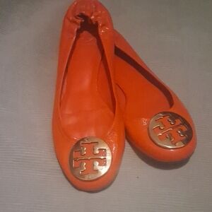 Tory Burch Women's Bright Orange Flats with Gold Emblem